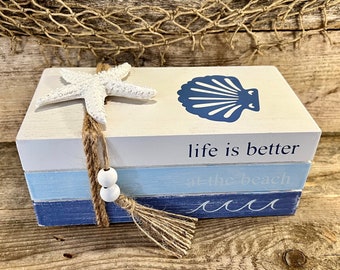 Life Is Better At The Beach Handmade Distressed Blue and White Faux Wood Book Stack with Starfish, Seashell, Beads and Tassel