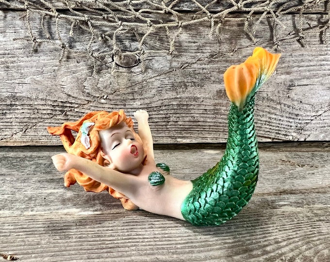 Miniature Resin “Yawning” Mermaid with Red Flowing Hair and Metallic Green Tail