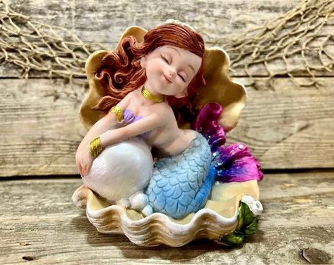 Resin Mermaid with Blue Tail Resting On Pearl Inside Giant Clam Shell Tabletop Statuette