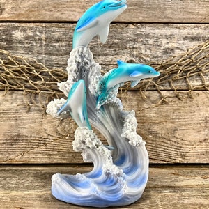 Resin Bottlenose Dolphin Trio Riding Sparkling Ocean Waves Statue