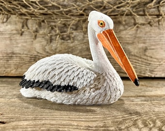 Great White Pelican Hand-Painted Resin Sitting Figurine