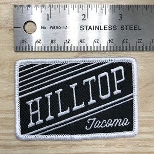 Écusson de quartier de Tacoma Hilltop. Écusson de thermoscellage