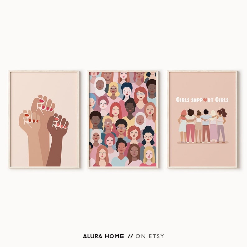 May include: Three printable wall art prints with a feminist theme. The first print features a group of raised fists in different skin tones. The second print features a pattern of diverse women's faces. The third print features a group of women with their arms around each other and the text "Girls Support Girls".
