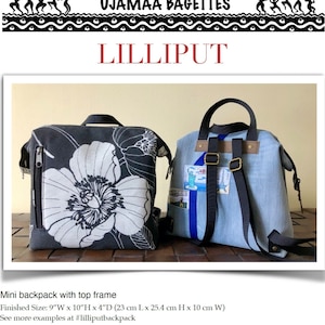 May include: Two mini backpacks with top frames. The backpack on the left is black with a white floral print. The backpack on the right is blue denim with a brown leather strap. Both backpacks have a top flap closure and a zippered pocket on the front. The backpacks are 9 inches wide, 10 inches high, and 4 inches deep.