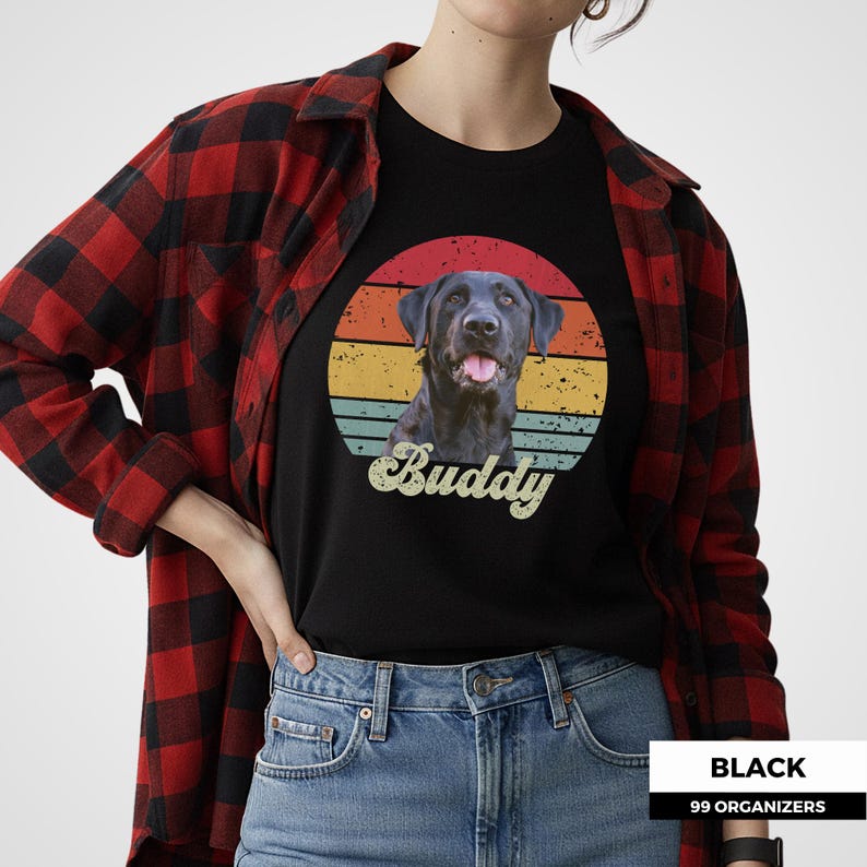 Personalized dog photo shirt featuring a custom pet portrait against a colorful vintage sunset made from distressed retro stripes. A large script pet name sits below the portrait for a bold personalized finish. This nostalgic custom pet design can be created from a favorite dog or cat photo and makes a thoughtful gift for pet owners, dog moms, dog dads, cat lovers, birthdays, holidays, pet memorials, and anyone celebrating a beloved companion.