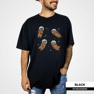 Retro-inspired capybara design for animal lovers, featuring adorable capybaras in space helmets. Perfect for gifting to kawaii fashion lovers, sci-fi fans, or anyone who enjoys weird animal memes and unique space apparel.