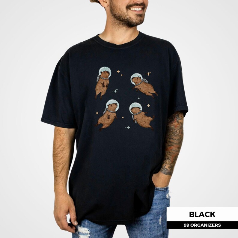 Retro-inspired capybara design for animal lovers, featuring adorable capybaras in space helmets. Perfect for gifting to kawaii fashion lovers, sci-fi fans, or anyone who enjoys weird animal memes and unique space apparel.
