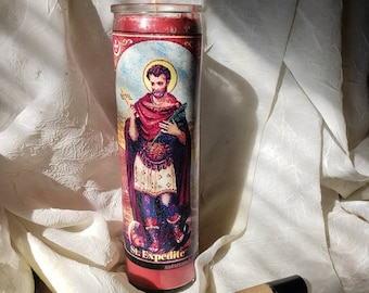 8" St. Expedite prayer candle + roll-on perfume oil.Handpoured San Expedito candle and oil, infused with herbs/roots/oils for fast results