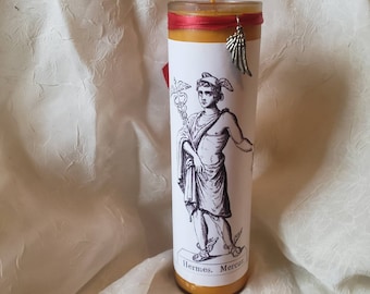 Vela de 20 cm con brillo naranja de Mercurio - Hermes, con dije de ala. Vela de oración grecorromana hecha a mano. Vela de brujería pagana.