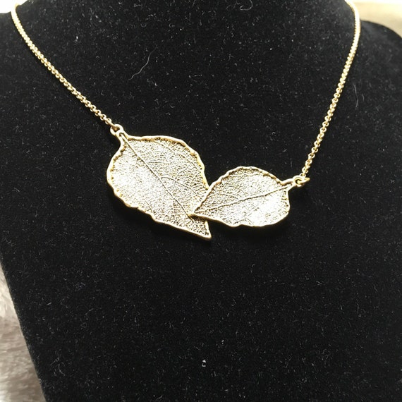 Lia Sophia gold leaves necklace - image 9