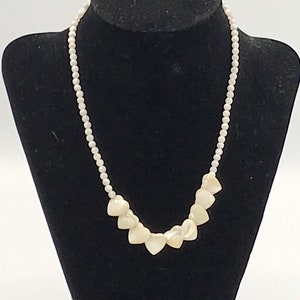 Vintage necklace with Mother’s pearl as heart, white tone