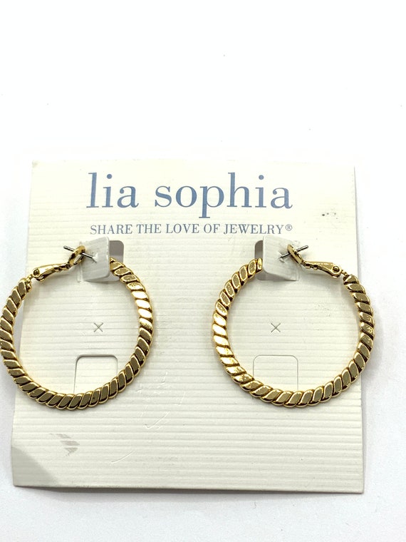 Gorgeous collectible gold tone round earrings by … - image 2