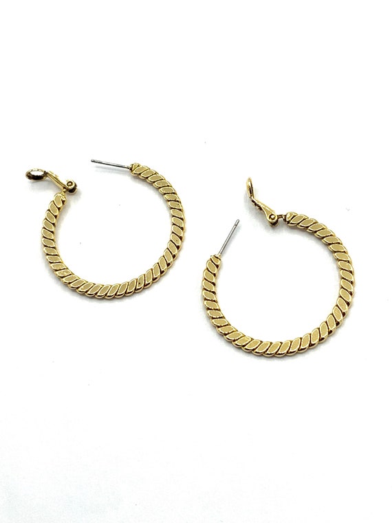 Gorgeous collectible gold tone round earrings by … - image 1
