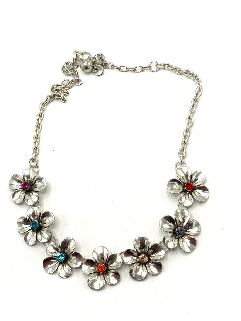 Gorgeous silver tone necklace with roses and rhinestone. image 1