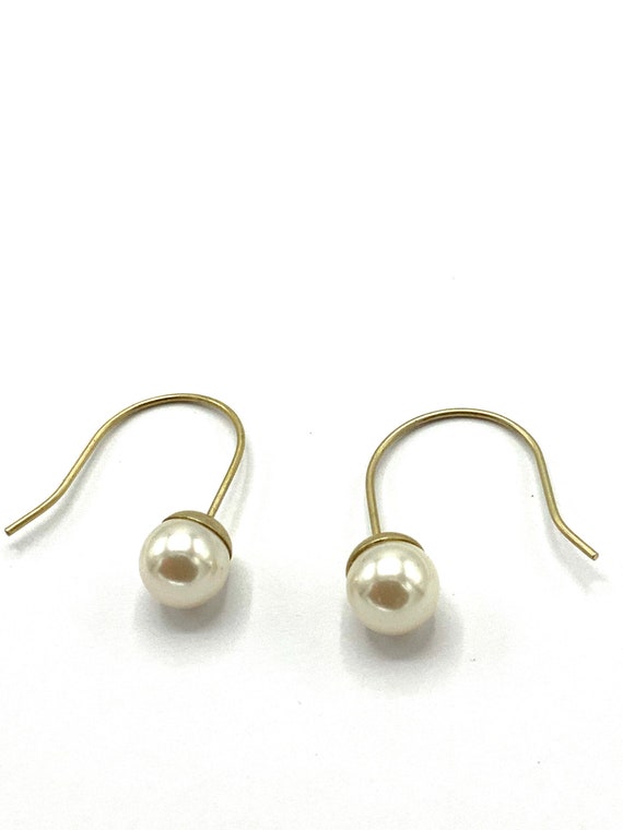 Gorgeous collectible pearl and hoop earrings by Lia Sophia