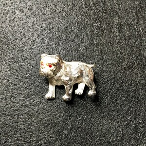 Vintage English Bulldog silver tone with crystal red eyes brooch.