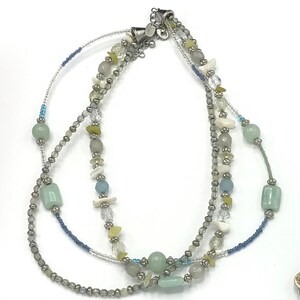 Multicolored, beads necklace by Lia Sophia, aqua tone. Signed, aqua
