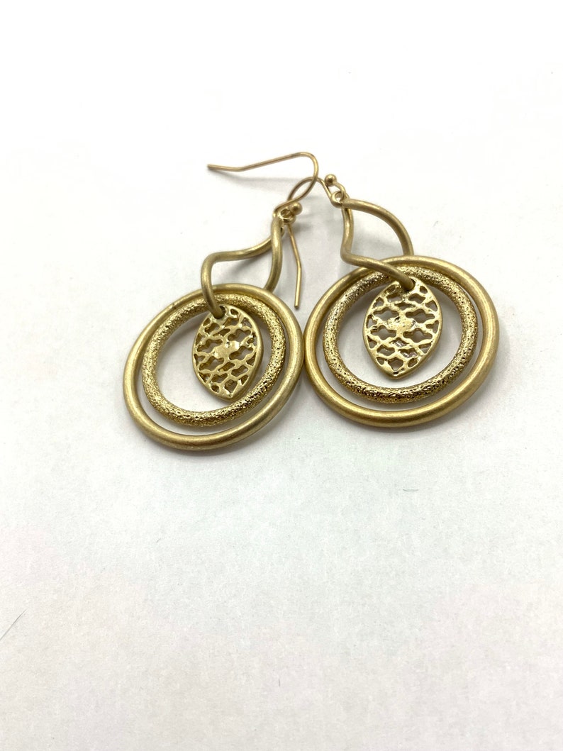 Gorgeous collectible and vintage old gold tone earrings by Lia Sophia, hoop, carved, round. image 10