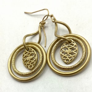 Gorgeous collectible and vintage old gold tone earrings by Lia Sophia, hoop, carved, round. image 9