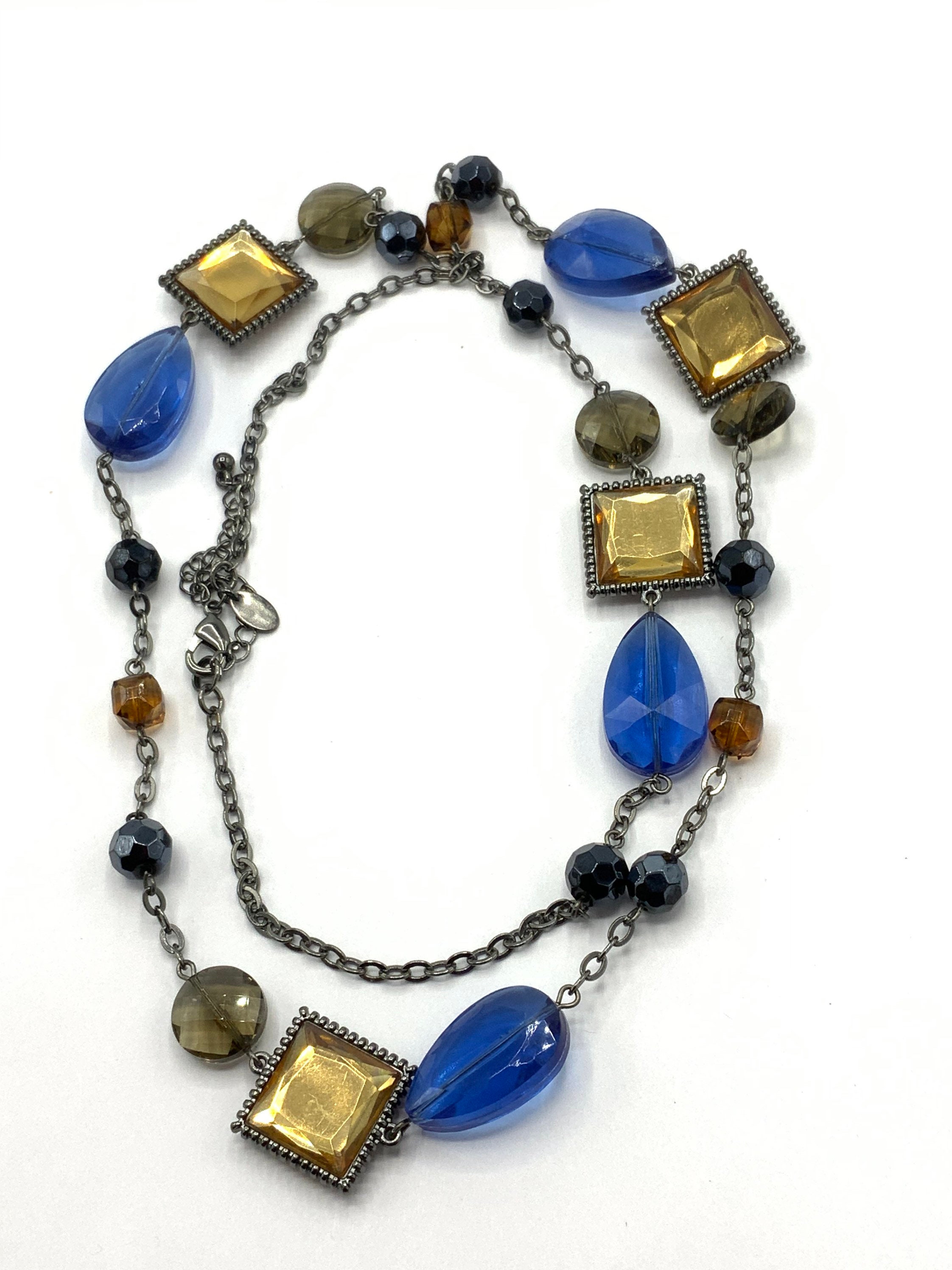 collectible blue and brown crystal necklace by Lia Etsy