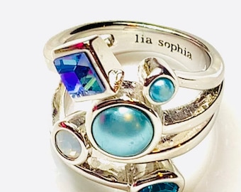 Multicolored crystal with pearl  and silver tone ring by Lia Sophia , signed