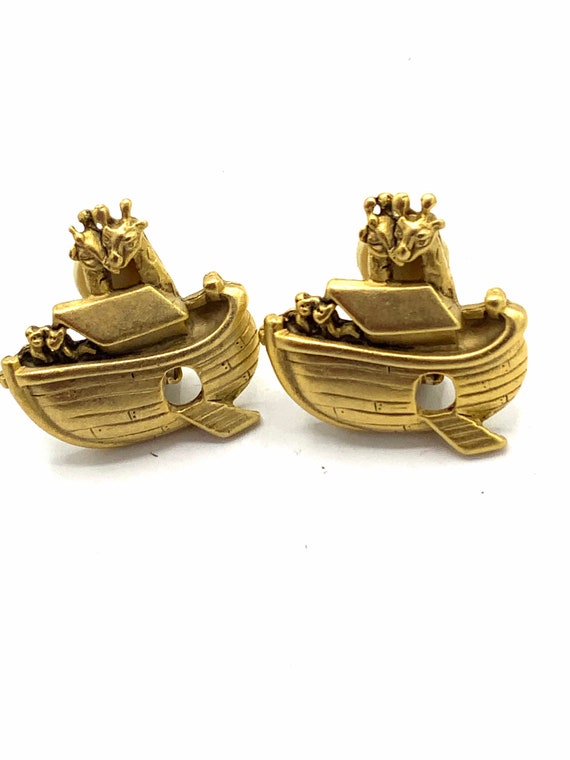 stud and star. Gorgeous collectible gold tone Pi sign earring by Cookie Lee