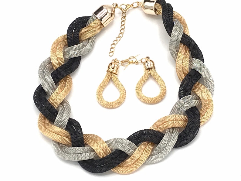 tree tones. Vintage braided metal chain necklace and earrings