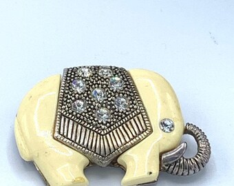 Vintage cream tone elephant  with silver tone and rhinestones brooch