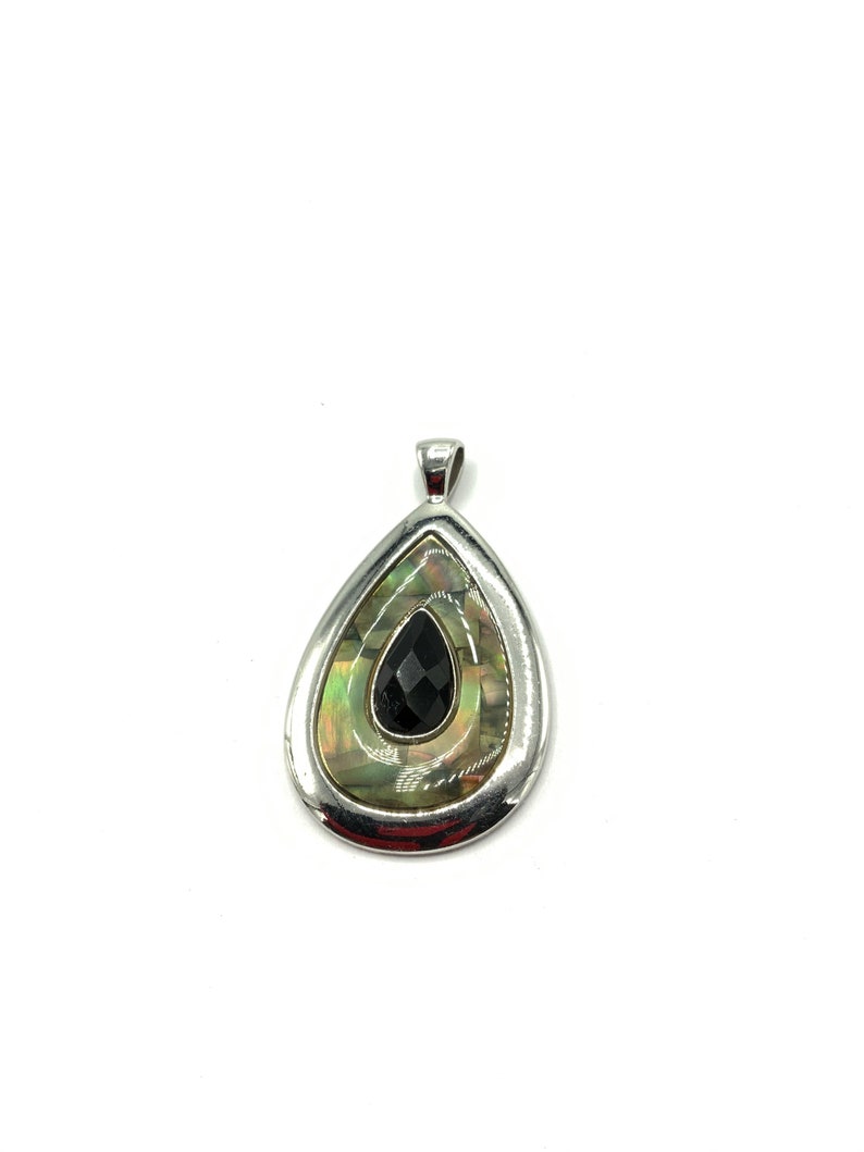 Gorgeous collectible teardrop pendant with abalone and black crystal by Lia Sophia and silver tone.