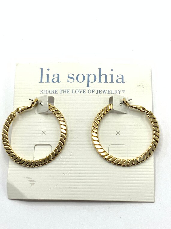 Gorgeous collectible gold tone round earrings by … - image 9