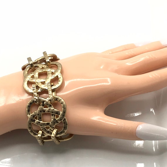Gorgeous gold tone hammered bracelet by Lia Sophi… - image 1