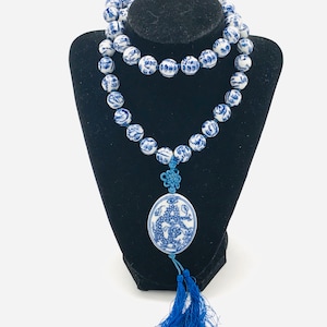 Vintage Asian necklace with a large pendant, blue and white.