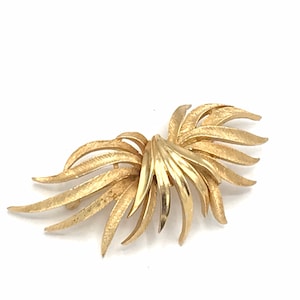 Vintage gold tone brooch by Coro image 1