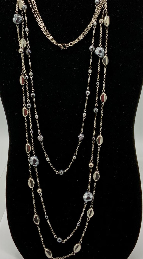 Lia Sophia multi-stand necklace gold and silver tone.