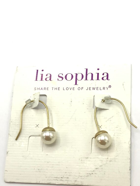 Gorgeous collectible pearl and hoop earrings by Lia Sophia View 2