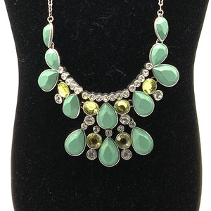 Gorgeous green rhinestone and stones necklace by Lia Sophia. Clear rhinestone , crystal.