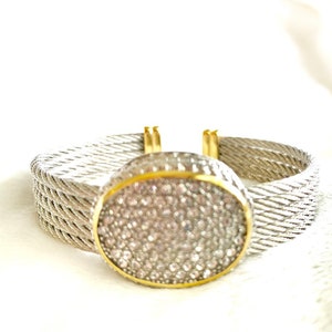 DSMK Stainless Steel bracelet with  zirconias ?
