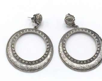 Sparkly Round silver  or gold tone earring with rhinestone by Lia Sophia.