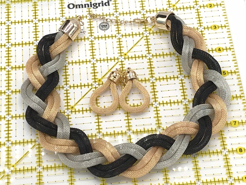 tree tones. Vintage braided metal chain necklace and earrings
