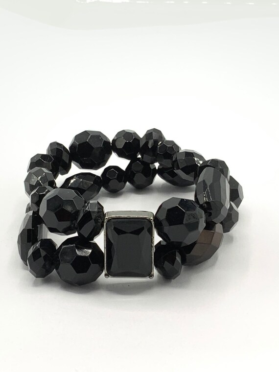 Gorgeous collectible black beads bracelet by Lia Sophia.