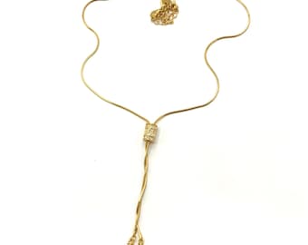 Gorgeous collectible gold tone chain with zirconias necklace by Lia Sophia., Ajustable bolo.