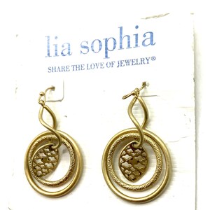 Gorgeous collectible and vintage old gold tone earrings by Lia Sophia, hoop, carved, round. image 2