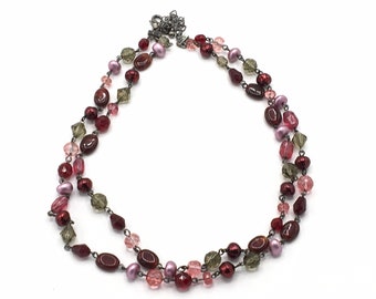 Multicolored beads necklace by Lia Sophia.red, pink and clear.