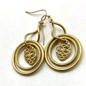 Gorgeous collectible and vintage old gold tone earrings by Lia Sophia, hoop, carved, round. image 4