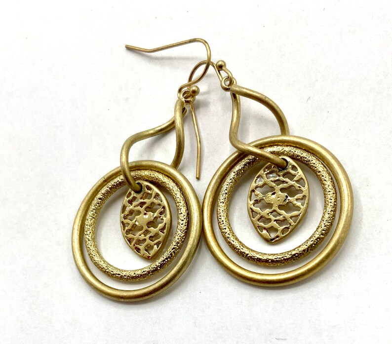 Gorgeous collectible and vintage old gold tone earrings by Lia Sophia, hoop, carved, round. image 4