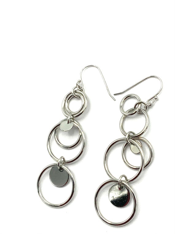 Gorgeous collectible silver tone earrings by Lia S