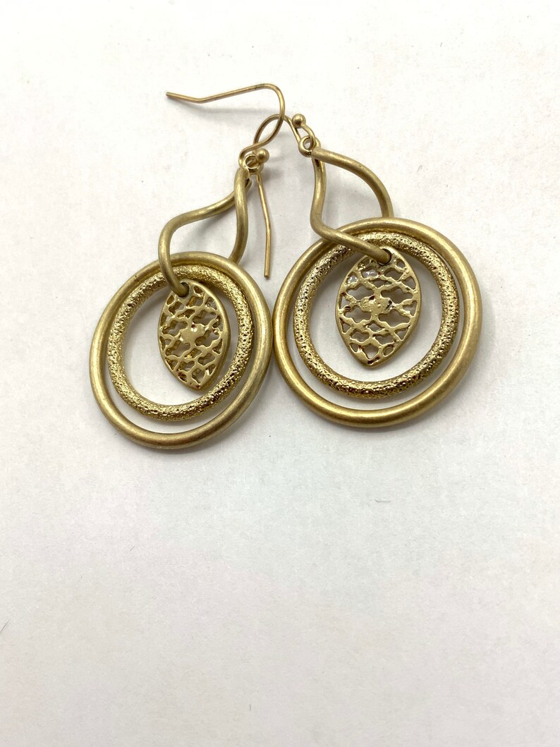 Gorgeous collectible and vintage old gold tone earrings by Lia Sophia, hoop, carved, round. image 7