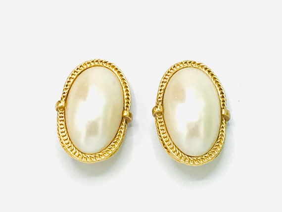 Large size of pearl and gold tone earrings. - image 1