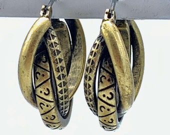 Gorgeous collectible and vintage Brass  or nickel Tone Cuff Earrings by Lia Sophia.