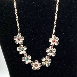 Gorgeous silver tone necklace with roses and rhinestone. image 10